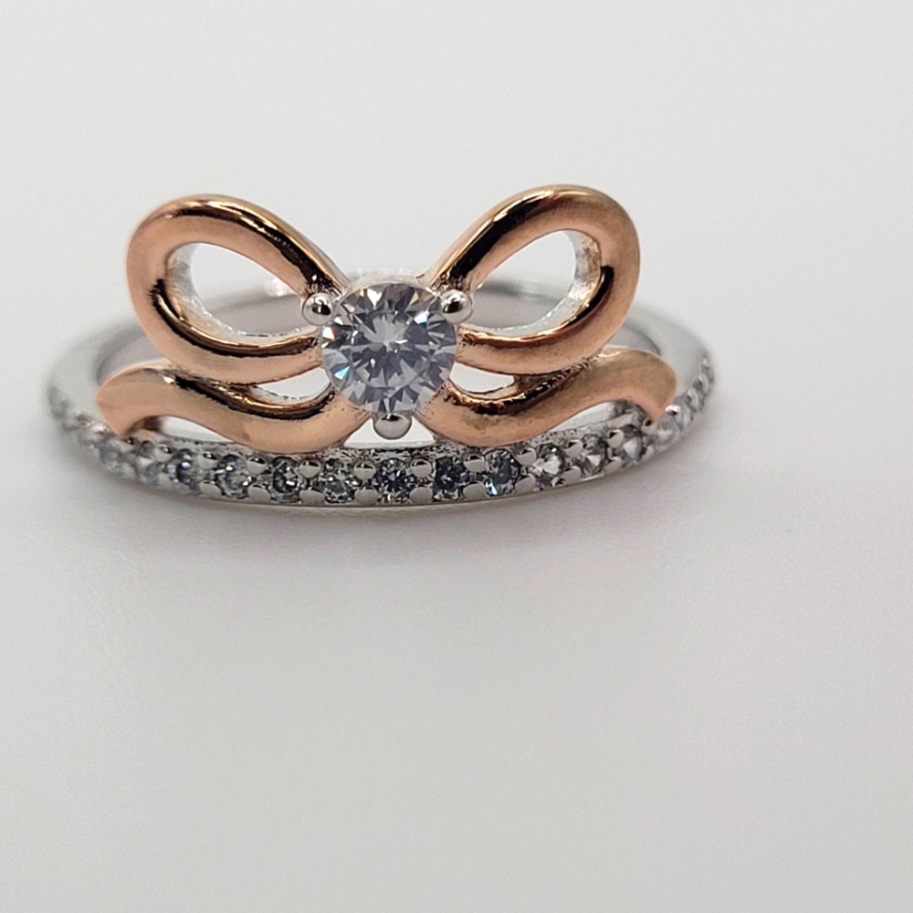 925 sterling silver and Rose Gold Bow Ring with gems. Size 6